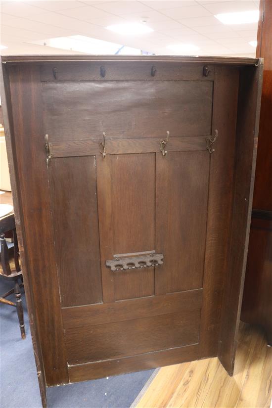 An oak church settle W.107cm